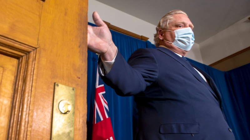 Ontario Premier Doug Ford arrives to make an announcement during the daily briefing at Queen's Park in Toronto on Thursday April 1, 2021. THE CANADIAN PRESS/Frank Gunn