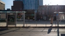 A lone commuter waits for the street car in Toronto on Wednesday, April 7, 2021. THE CANADIAN PRESS/Tijana Martin