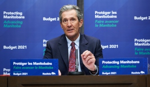 Premier of Manitoba Brian Pallister speaks at a news conference after the 2021 budget was delivered at the Manitoba Legislative Building in Winnipeg on Wednesday, April 7, 2021. THE CANADIAN PRESS/David Lipnowski