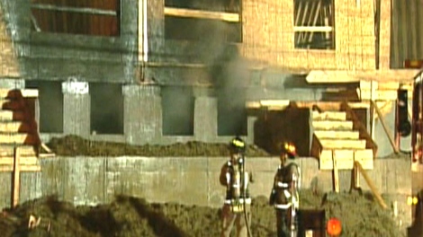 Fire crews battle a blaze in Toronto's east end during the early morning hours of Saturday, Nov. 7, 2009. Officials are now probing the cause of the blaze.