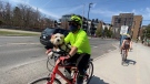 Kirk Parsons and his pup, Max, are taking a bike ride along the Rideau Canal pathway. (Tyler Fleming / CTV News Ottawa)