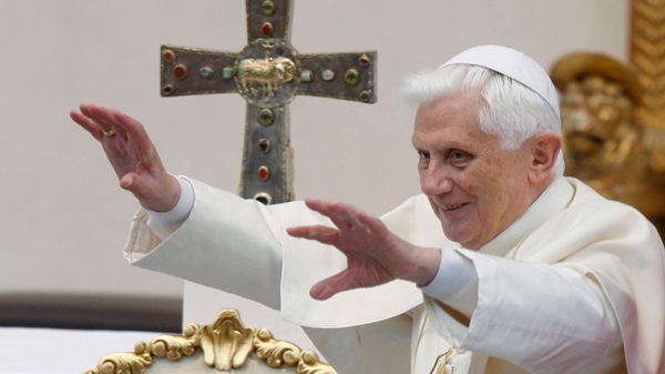 Pope Benedict XVI waves as he arrives to celebrate a mass in Paul VI square in Brescia, Italy, on Sunday, Nov. 8, 2009. (AP / Luca Bruno)