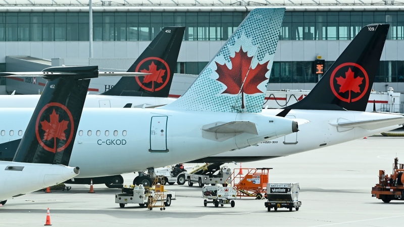 Air Canada planes sit on the tarmac at Pearson International airport during the COVID-19 pandemic in Toronto on Wednesday, Oct. 14, 2020. THE CANADIAN PRESS/Nathan Denette