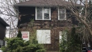 Boarded up house at 357-359 Indian Road in Windsor, Ont. on Monday, April 12, 2021. (Alana Hadadean / CTV Windsor) 