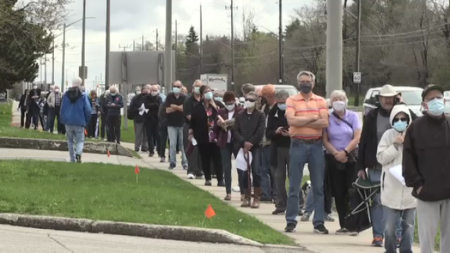 A long line is seen at the North London Optimist Centre Vaccination Clinic on Monday, April 12, 2021. (CTV London)