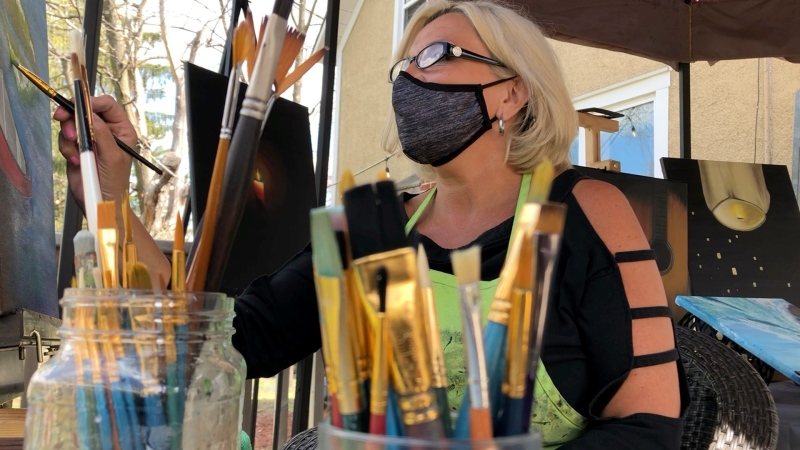 JoAnne Simon enjoying her newfound talent, painting. (Dave Charbonneau / CTV News Ottawa)
