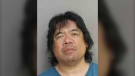 Toronto resident Jonathan Wong, 50, has been charged with voyeurism following an investigation. (Toronto Police Service) 