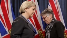 Dr. Bonnie Henry and Dr. Penny Ballem take turns at the podium as they talk about phase two in B.C.'s COVID-19 immunization plan at Legislature in Victoria, B.C., on Monday, March 1, 2021. THE CANADIAN PRESS/Chad Hipolito