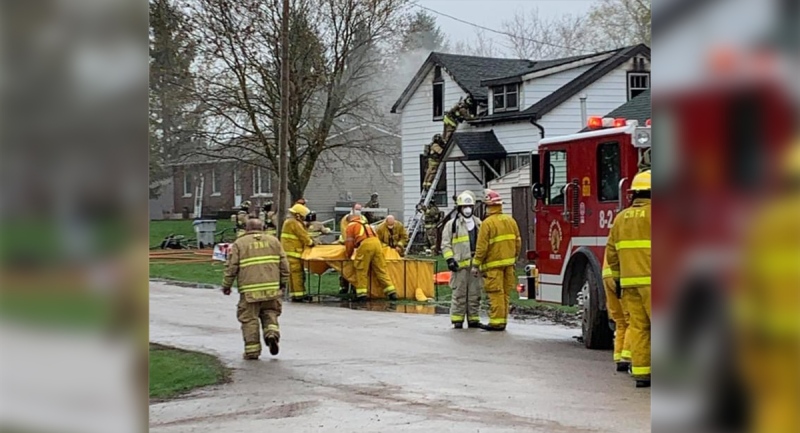 Crews work at the scene of a house fire in Londesborough, Ont. on Friday, April 16, 2021. (Source: Andrea Hulley)