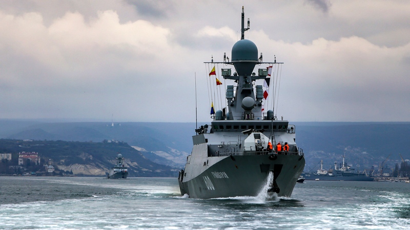 This handout photo released on Wednesday, April 14, 2021 by Russian Defense Ministry Press Service shows, Russian navy ships are seen during navy drills in the Black Sea. (Russian Defense Ministry Press Service via AP)