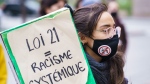 People take part in a demonstration following a Superior Court ruling on Bill 21, Quebec's secularism law, in Montreal on Tuesday, April 20, 2021. THE CANADIAN PRESS/Paul Chiasson