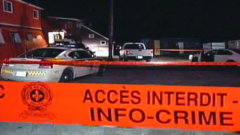 Police tape surrounds a home in Papineauville after Quebec provincial police were involved in a fatal shooting, Sunday, Nov. 8, 2009. Photo courtesy: TVA