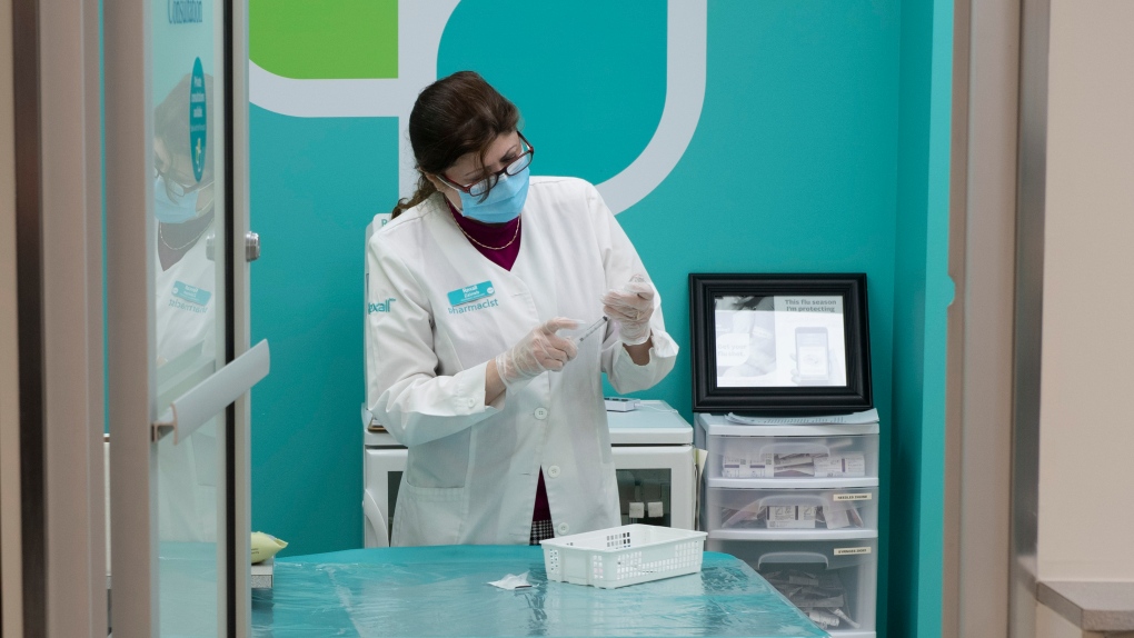 Pharmacist prepares COVID-19 vaccines