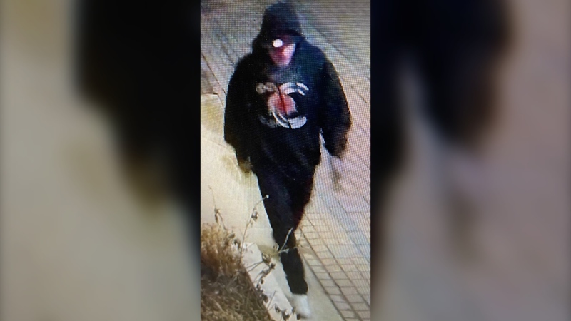 One of the two suspects wanted in connection with a robbery at a Winnipeg Beach business (Image source: Manitoba RCMP)