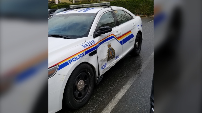 The damaged police cruiser is shown: (Nanaimo RCMP)