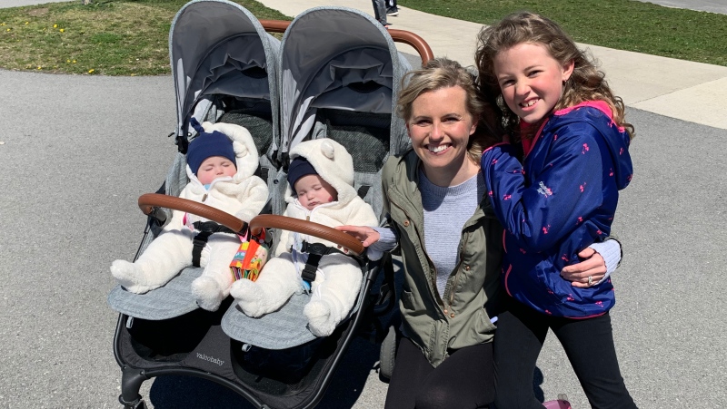 Sarah Millard says this past year has been a challenge. She gave birth to twins Owen and Oliver in September and has been helping Courtney, 8, with online learning. (Kimberley Johnson / CTV News Ottawa)