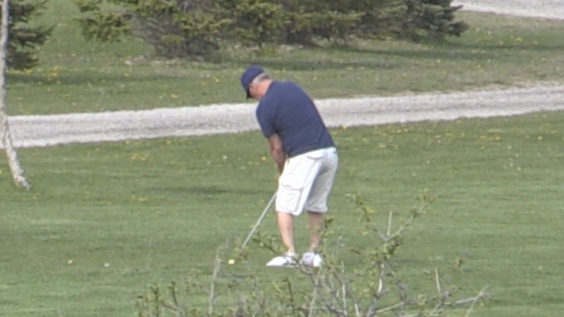 A man is seen golfing at the currently closed Fanshawe Golf Course on Sunday, May 2, 2021. (Sean Irvine / CTV London)
