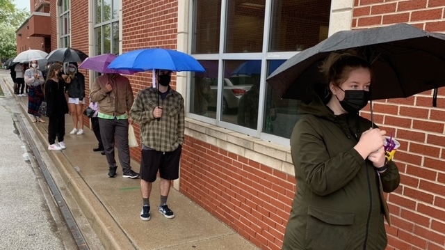 People lined up for a pop-up COVID-19 vaccination clinic for those 18 and older opened at St. Angela Centre and Hall on Erie Street in Windsor, Ont. on Monday, May 3, 2021. (Chris Campbell/CTV Windsor)