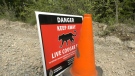 A sign warns the public of a cougar trap set in B.C.'s Fraser Valley on Wednesday, May 5, 2021. (Michele Brunoro / CTV News)