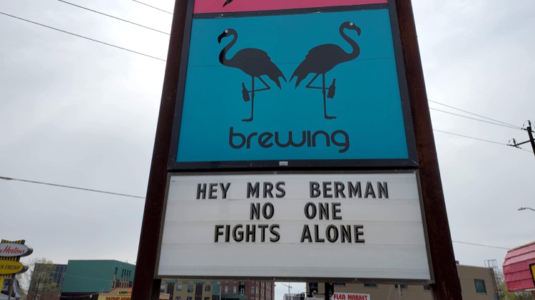 Kingston businesses share a message of support for education assistant Angie Berman. (Photo courtesy: Kingston's Move 98.3)