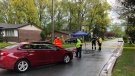 A cyclist was struck by a vehicle on Todd Lane in LaSalle, Ont. on Friday, May 7, 2021. (Angelo Aversa/CTV Windsor)