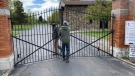 Park staff at Evergreen Memorial Park Cemetery in Leamington close the gates for the weekend on May 8, 2021. (Rich Garton / CTV Windsor)