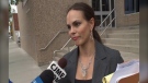 Sharon Fox speaks to reporters in front of the Provincial Courthouse in Regina, in June 2017. 
