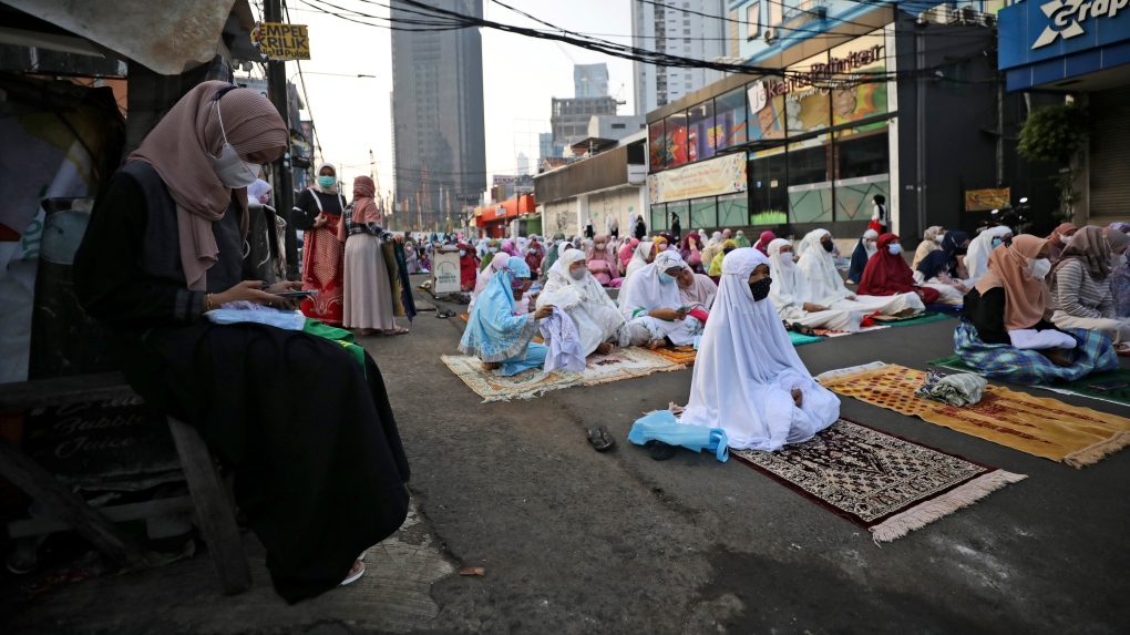 People celebrate Eid al-Fitr during pandemic