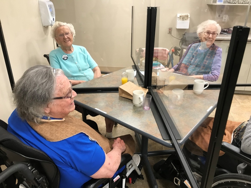 Residents at Heron Terrace in Windsor, Ont. are all smiles now that communal dining is back after more than a year of eating in isolation. Michelle Maluske/CTV Windsor