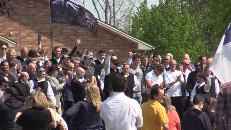 Hundreds gathered for an outdoor service at the Church of God in Aylmer, Ont. on Sunday, May 16, 2021. (Brent Lale/CTV London)