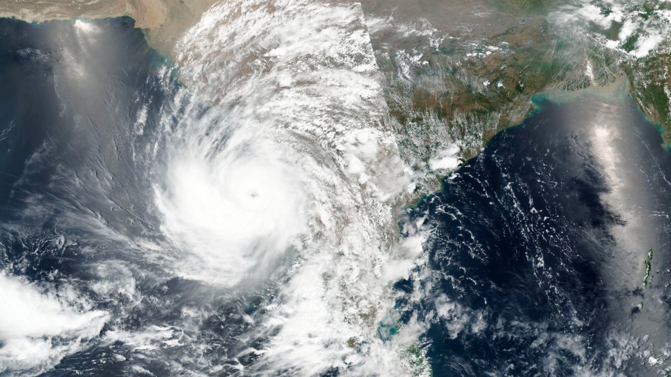 India braces for powerful cyclone amid deadly virus surge | CTV News