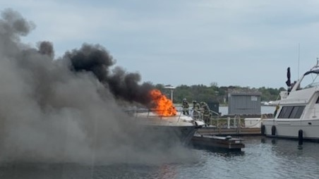 Southern Georgian Bay OPP and Midland Fire at the scene of a boat fire in Midland on Wed., May 19, 2021. (Southern Georgian Bay OPP)