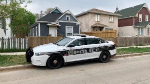 A Winnipeg police vehicle remains at the scene of a homicide on Beverley Street on May 19 (CTV News Photo Scott Andersson)
