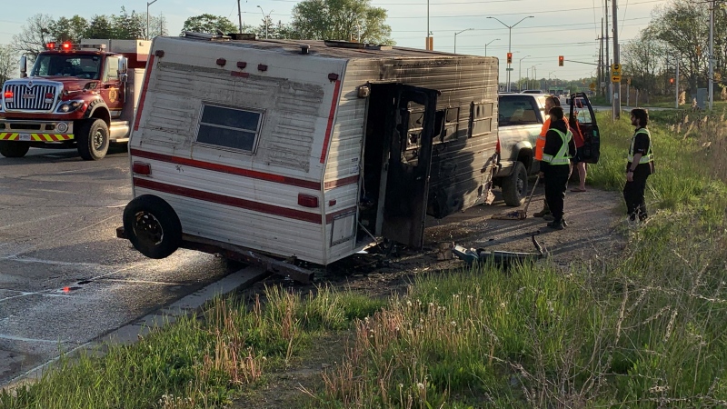 Trailer fire on Exeter Road in London, Ont. on May 19, 2021. (Bryan Bicknell/CTV London)