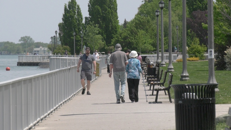 Walkers along the riverfront in Windsor, Ont., on Wednesday, May 20, 2021. (Bob Bellacicco / CTV Windsor)