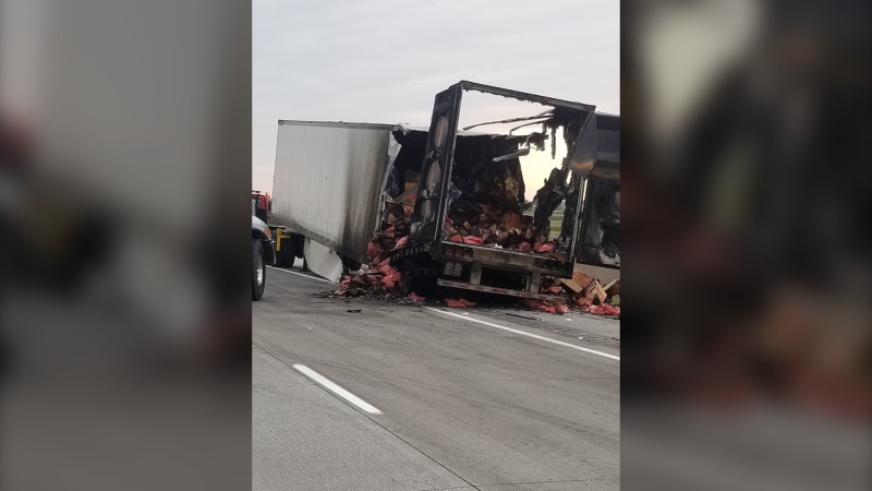 Police say a tractor trailer loaded with 44,000 pounds of beef became fully engulfed in flames on Highway 401 in Chatham-Kent, Ont. (Courtesy OPP)