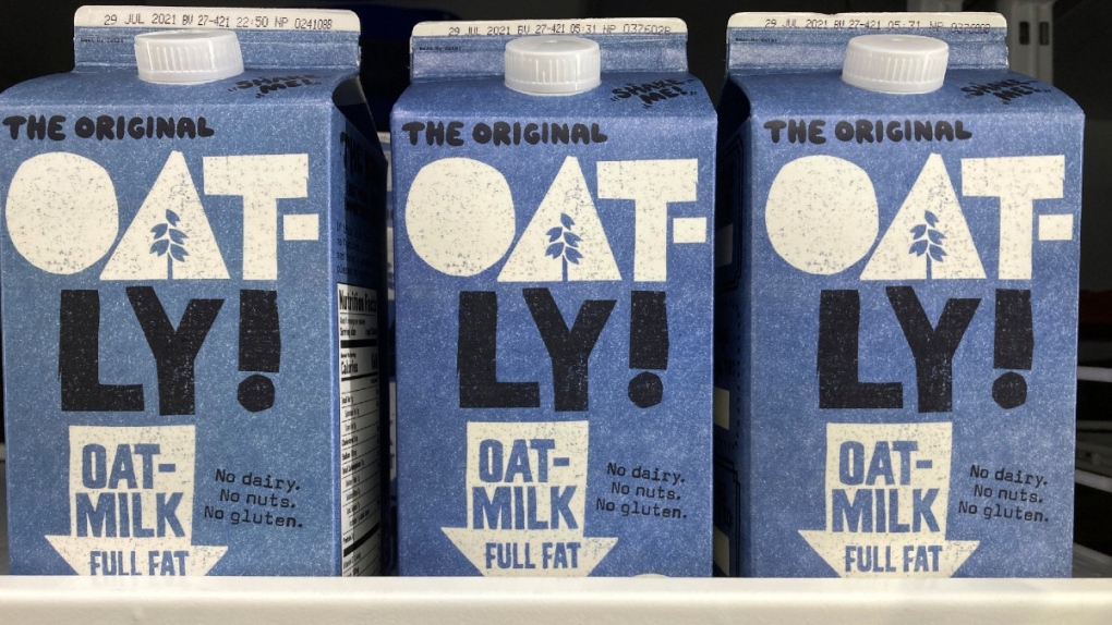 Oatly containers displayed at a grocery store