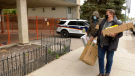 Sergii Bogdanoff returns to the Prairie Heights condo building to pick up some possessions. (Dale Cooper/CTV Saskatoon)