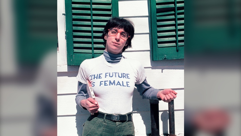 Alix Dobkin poses in a t-shirt that reads "The Future is Female" in Preston Hollow, N.Y. in 1975. Dobkin, the lesbian singer and feminist activist, died in her home from a brain aneurysm and stroke. She was 80. (Liza Cowen via AP)
