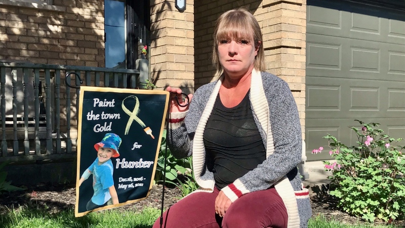 Lisa Mason, who created a banner of the late Hunter Weston after hearing of his passing, is seen outside her Woodstock, Ont. home on May 27, 2021. (Sean Irvine CTV News)