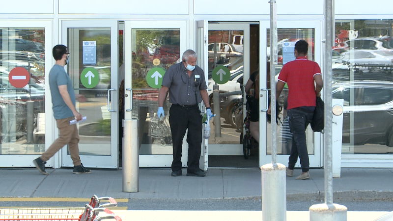 Customers enter Les Promenades shopping centre in Gatineau.