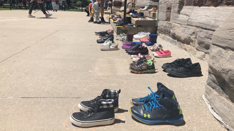 In memory of children found in residential school mass grave, children’s shoes were placed at steps of cathedra lin London, Ont. on Sunday, May 30, 2021. (Jordyn Read/CTV London)