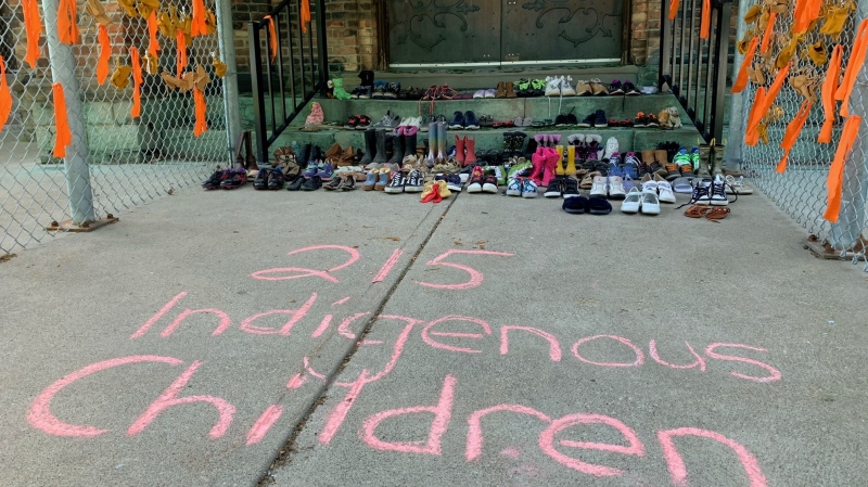 Children’s shoes on the steps of Assumption Church in Windsor, in memory of the 215 children whose remains were found in a mass grave at a residential school in Kamloops B.C. last week. (Chris Campbell)