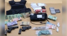 Guns, drugs and cash were seized in London, Ont. on Sunday, May 30, 2021. (Source: London Police Service)