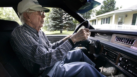 Harold Harryman, 100, drives to the Douds Community Center for the senior meal program Tuesday, June 5, 2007 in Douds, Iowa. Harryman is one of about 40 drivers 100-years-old or older that still drive in Iowa. Douds says he has been driving accident and ticket-free for almost 90 of his 100 years. And he continues to add to that streak as he joined the ranks earlier this year of the 35 people in Iowa who still have driver's licenses at age 100 or older. (The Gazette / Brian Ray)