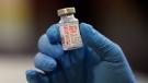 FILE - A vial of the Moderna COVID-19 vaccine is displayed at a pop-up vaccine clinic for EMS workers Center in Salt Lake City on January 5, 2021. THE CANADIAN PRESS/AP, Rick Bowmer