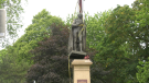 Crews remove a statue of Sir John A. Macdonald from City Park in Kingston, Ont. on Friday. (Kimberley Johnson/CTV News Ottawa)