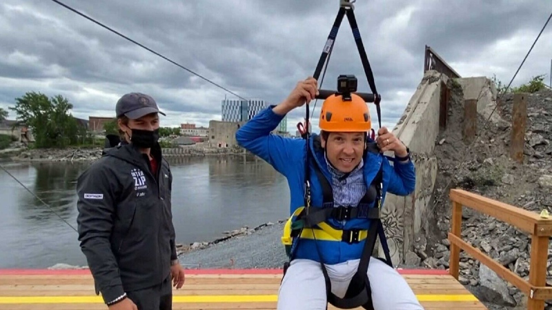 CTV's Tyler Fleming gets ready to ride the new zipline from Ottawa to Gatineau on Tuesday.