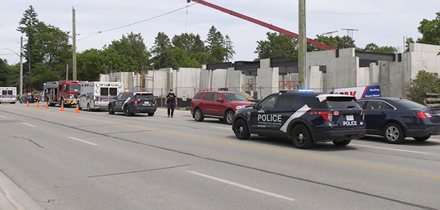 Police and emergency crews attend the scene of an industrial accident that sent one person to hospital on Dunlop Street in Barrie, Ont. on Thurs. June 24, 2021 (Dave Erskine/CTV News)