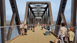 An artist's rendering of the proposed multi-use pathway on the newly renamed Chief William Commanda Bridge over the Ottawa River. A $22.6 million refurbishment would turn the defunct rail bridge into an active transportation corridor. (Photo: City of Ottawa)